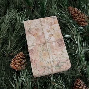 A gorgeous floral gift wrap in shades of blush, pink, terra cotta and green, soft romantic design for a wedding or bridal shower.
