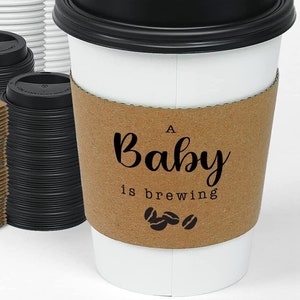 A Baby Is Brewing Coffee Cups With Sleeves