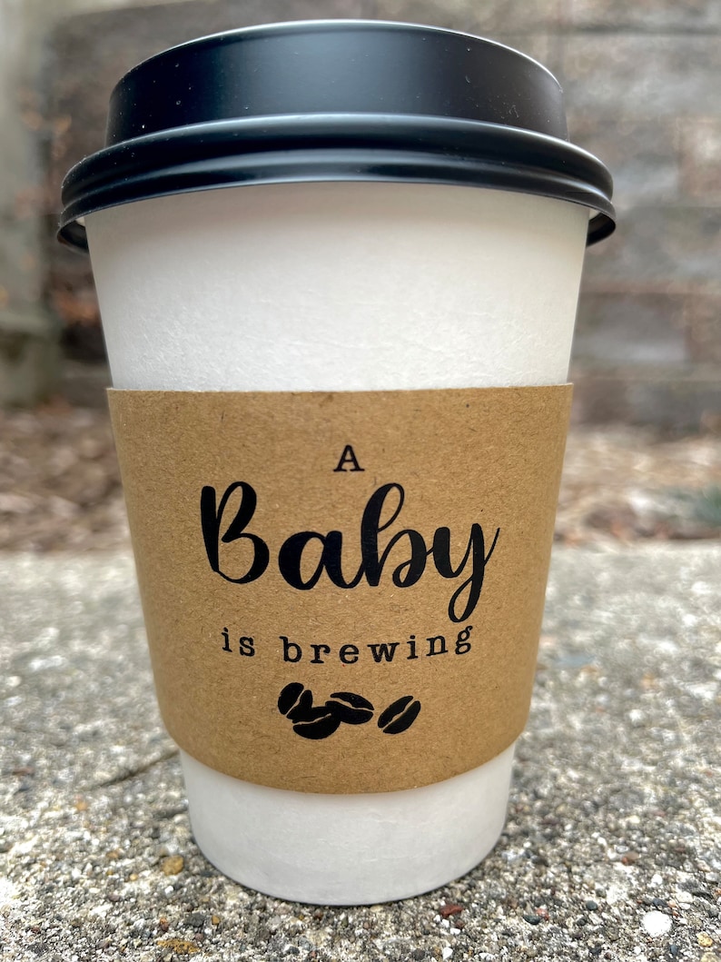 A Baby Is Brewing Coffee Cups With Sleeves