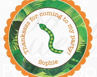May include: A green snake with yellow and red markings is curled up on a green and brown jungle-themed circle with the text "Thankssss for coming to my party! Sophie".