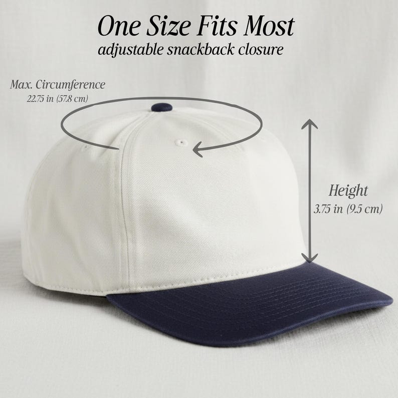 May include: A white baseball cap with a dark blue brim and an adjustable snapback closure. The cap features a maximum circumference of 22.75 inches and a height of 3.75 inches. Text on the image reads One Size Fits Most, adjustable snapback closure.