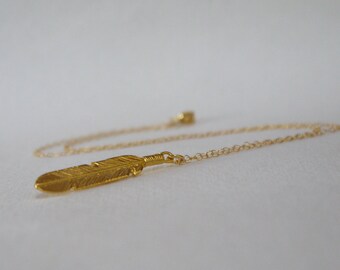 Feather necklace  in gold