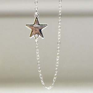 Sideways star necklace in silver