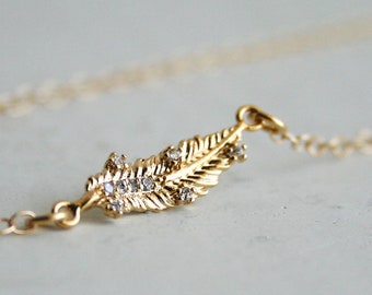 Sideway leaf cz necklace in gold