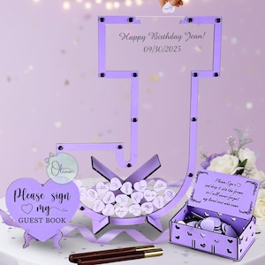 May include: A lavender wooden guest book alternative with a heart-shaped sign that reads "Please sign my guest book." The design includes a frame with the text "Happy Birthday Jean! 09/30/2025."