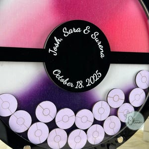 Gaming wedding guest book alternative inspired by Pokéball design
