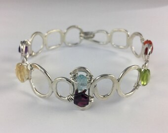 Sterling silver hand forged cuff bracelet with gemstones