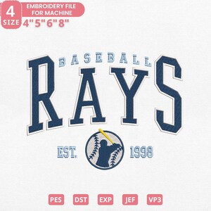 May include: White background with a navy blue and white baseball design. The word "RAYS" arches across the top, with "BASEBALL" above it. Below, a baseball graphic with a batter and the text "EST. 1998". Includes embroidery file sizes.