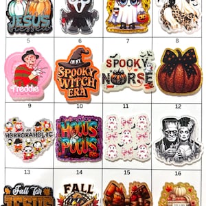 May include: A collection of sixteen decorative acrylic charms featuring various Halloween and autumn-themed designs, including ghosts, pumpkins, horror movie characters, and text-based graphics like Pumpkin and Jesus Blessed and Hocus Pocus.