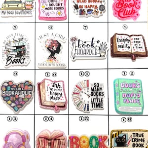 May include: A collection of colorful book-themed charms with various designs and text. The charms include phrases like "Bookaholic," "Book Worm," and "Happy Place." Some charms feature books, coffee cups, and other related imagery.