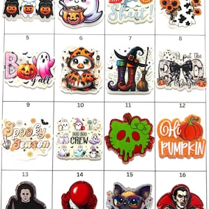 May include: A collection of sixteen Halloween-themed acrylic charms featuring various designs including ghosts, pumpkins, a witch's boots, a cat, a bat, and horror characters with text such as Boo Sheet, Boo y'all, Spooky Season, and Free Hugs.