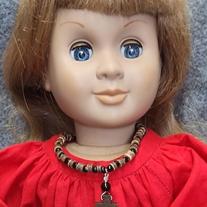 18-inch doll necklace, wood and black beads with wood cross