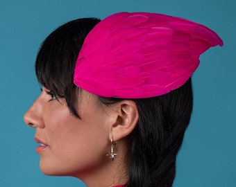 Hot pink feather wing mini hat or fascinator headpiece