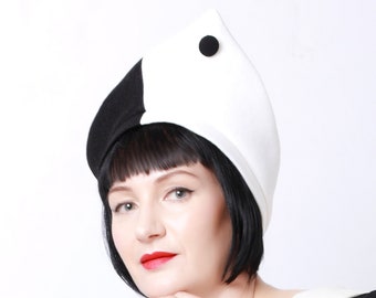 Black and white pointed felt hat with button, 80s monochrome style asymmetric design