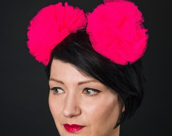 Large neon pink pompom hair band, giant kawaii ears cosplay or clubbing accessory
