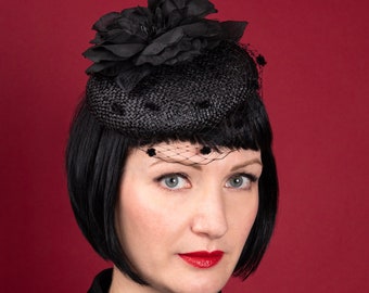 Small black straw hat with flower and veil, ladies modern wedding floral fascinator with spotty veiling