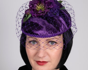 Purple silk velvet floral fascinator, ladies wedding or Ascot hat with birdcage veil and flowers