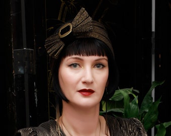 Golden black turban style headpiece with bow and gold buckle, vintage look jinsin fascinator