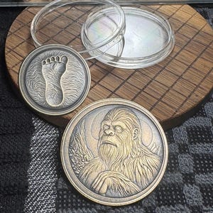 Sasquatch and Bigfoot impression double sided brass and engraved challenge decision token coin