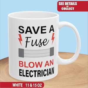 May include: White ceramic mug with the text "SAVE A Fuse BLOW AN ELECTRICIAN" in black and red. The design includes a graphic of a fuse and lightning bolts. The mug is available in 11 and 15 oz sizes.