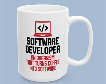 May include: A white ceramic mug featuring a red laptop icon with code brackets, the black text SOFTWARE DEVELOPER, and the red text AN ORGANISM THAT TURNS COFFEE INTO SOFTWARE printed on the front side with a curved handle on the right side.