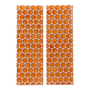 May include: Two rectangular panels with a honeycomb pattern. The cells are a warm orange color, and the outlines are white. The panels are set against a white background. The design resembles a beehive.