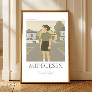 May include: A framed art print of a scene from Jeffrey Eugenides' novel "Middlesex". The illustration shows a person on a street with houses. The title "Middlesex" is displayed below the image, with a quote from the book.