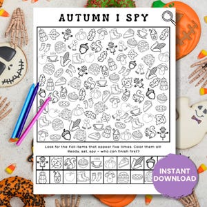 May include: Black and white "Autumn I Spy" printable game with fall-themed illustrations. Includes pumpkins, acorns, and leaves. The text reads "Look for the Fall items that appear five times. Color them all! Ready, set, spy - who can finish first?" and "Instant Download".