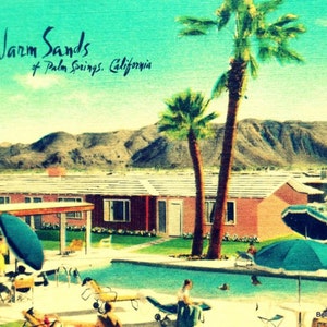 May include: Vintage postcard featuring a resort scene in Palm Springs, California. The image shows a swimming pool, palm trees, and people relaxing. The text "The Warm Sands of Palm Springs, California" is visible.