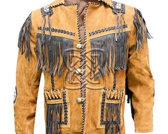May include: A tan suede jacket with black fringe and decorative stitching. The jacket features a collared neckline, button closures, and pockets. The word "Snazzy" is printed at the top left.
