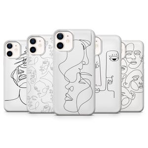 Puede incluir: Cinco fundas blancas para teléfono con diseños minimalistas de rostros en líneas negras. Cada funda presenta una interpretación artística diferente de los rasgos faciales, con un estilo moderno.