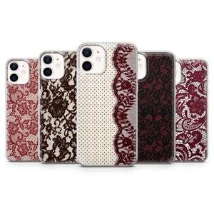 May include: A collection of five phone cases with various lace designs. The cases feature patterns in burgundy, black, and white, including floral and dotted motifs. The cases are designed to fit a smartphone.