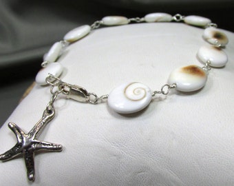 Spirits Eye Sea Shell with Star Fish in Sterling Silver