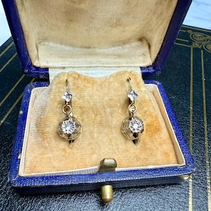 A refined pair of early 1900s France, with Old-Cut Diamonds masterfully crafted in 18-carat yellow gold (750/1000)