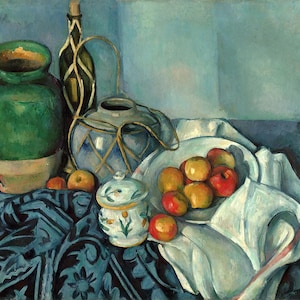 May include: Still life painting featuring a green vase, a blue and white patterned pitcher, a bottle, and a bowl of apples. The objects are arranged on a blue patterned cloth, with a white cloth draped nearby. The color palette is dominated by blues, greens, and reds.