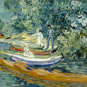 May include: Impressionistic painting of boats on a riverbank. The artwork features a variety of boats in shades of yellow, blue, and green, with figures of people near the boats. Lush green foliage lines the river's edge, and a sailboat is visible.