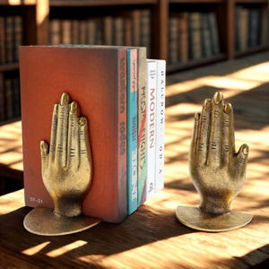 Handvormige boekensteun: decoratieve boekensteun