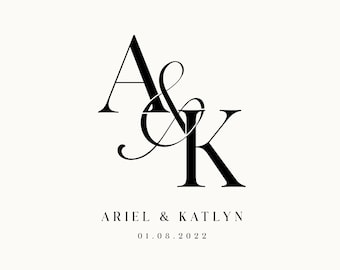 May include: Elegant black monogram with the letters "A" and "K" intertwined, with "&" in between. Below the monogram, the names "ARIEL & KATLYN" and the date "01.08.2022" are displayed in a serif font against a cream background. The design is simple and sophisticated.