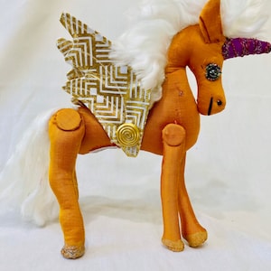 Unicorn made from Gold Silk  Fabric . Recycled Fabric unicorn. Unicorn Toy. Unicorn Plushie. Fantasy Horse horse. Cloth sculpture Unicorn