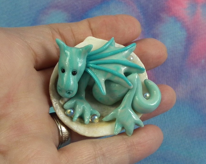 Baby Elemental Water Dragon 'Allurah' in seashell OOAK SCULPT by Artist Ann Galvin