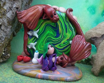 Tiny winged Sprite 'Nerys' 1" on magical door tableau with Dragon Guardians OOAK Sculpt by Ann Galvin Fairy Door