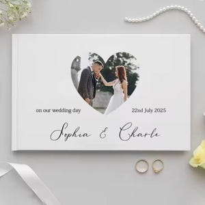 Personalized wedding guest book – A refined album with a noble and refined design, with an elegant white cover and a horizontal format.