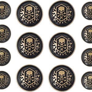 May include: Set of 10 gold-toned metal buttons with a black background and a skull and crossbones design. The buttons are in various sizes.