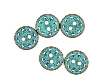 May include: Five turquoise and copper two-hole buttons with a decorative design.