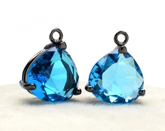 2 Pear Drop Light Blue Crystal Glass Pendant, 15mm, Black Color Plated over Brass Prong Setting. [P2020039]