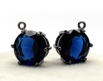 2 Round Montana Blue Crystal Glass Pendant, 16mm, Black Color Plated over Brass Prong Setting. [R2020480]