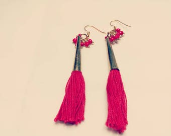 Red tassel drop earrings,  gold tone caps and red cluster beads