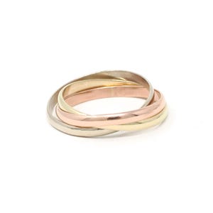 Anillo Rolling Trinity - Moderno, oro amarillo, rosa y blanco de 14k, tres bandas entrelazadas - Joyería fina llamativa multicolor de los años 80, talla 5