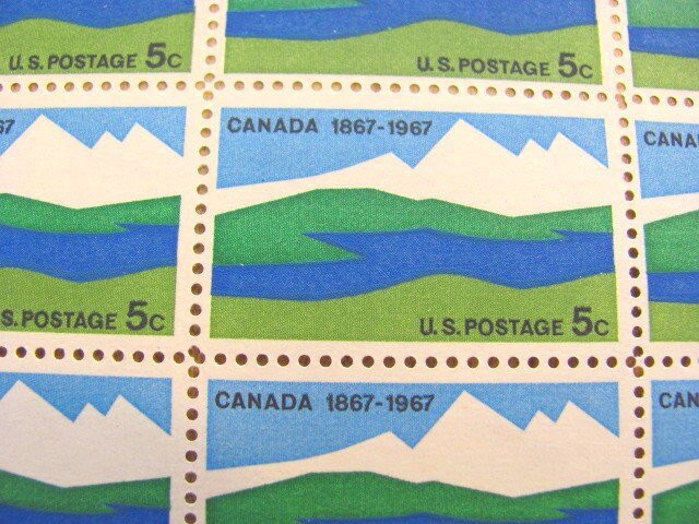 切手 カナダ国旗50周年記念未切断プレスシート カナダ 100 周年記念 50