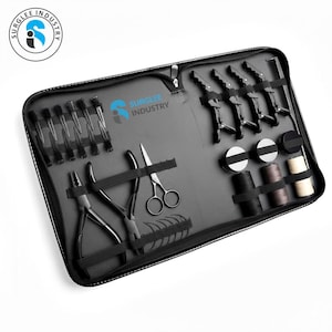 May include: A black zippered case containing various tools, including scissors, pliers, hair clips, and spools of thread. The case has the "SURGLEE INDUSTRY" logo in the upper left corner. The tools are neatly arranged within the case.